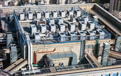 Air conditioning units on top of a building.