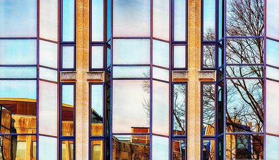 Reflections in a glass fronted building